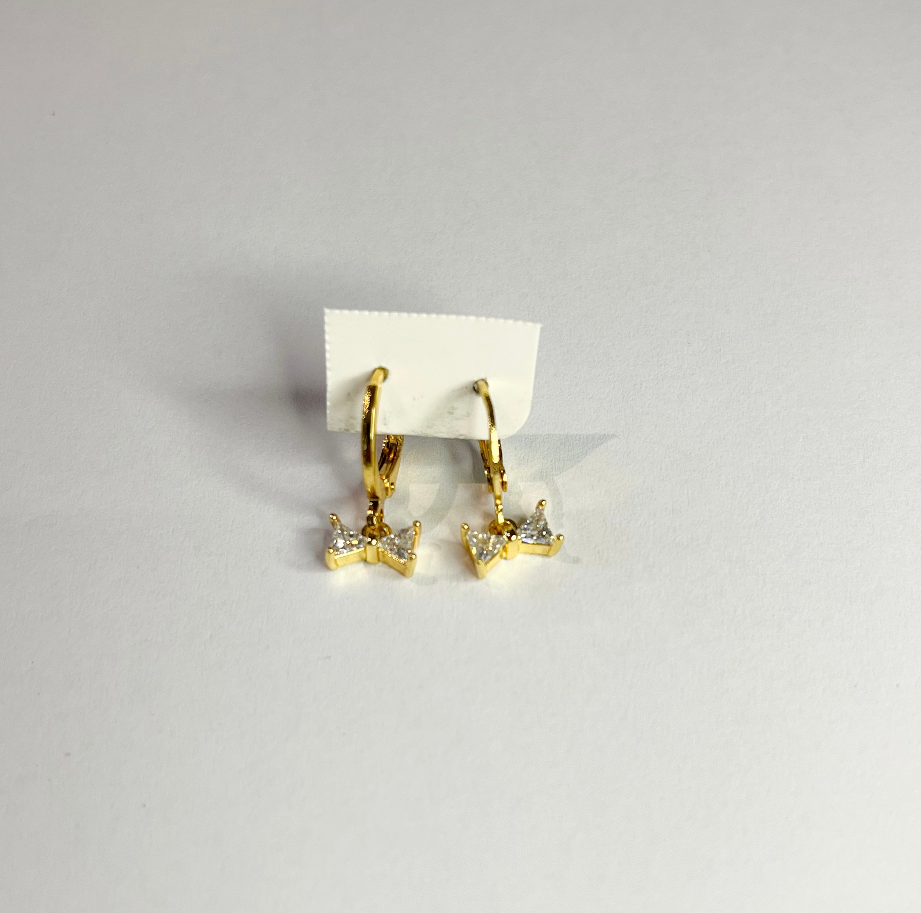 Gold-plated cubic zirconia bow dangle earrings