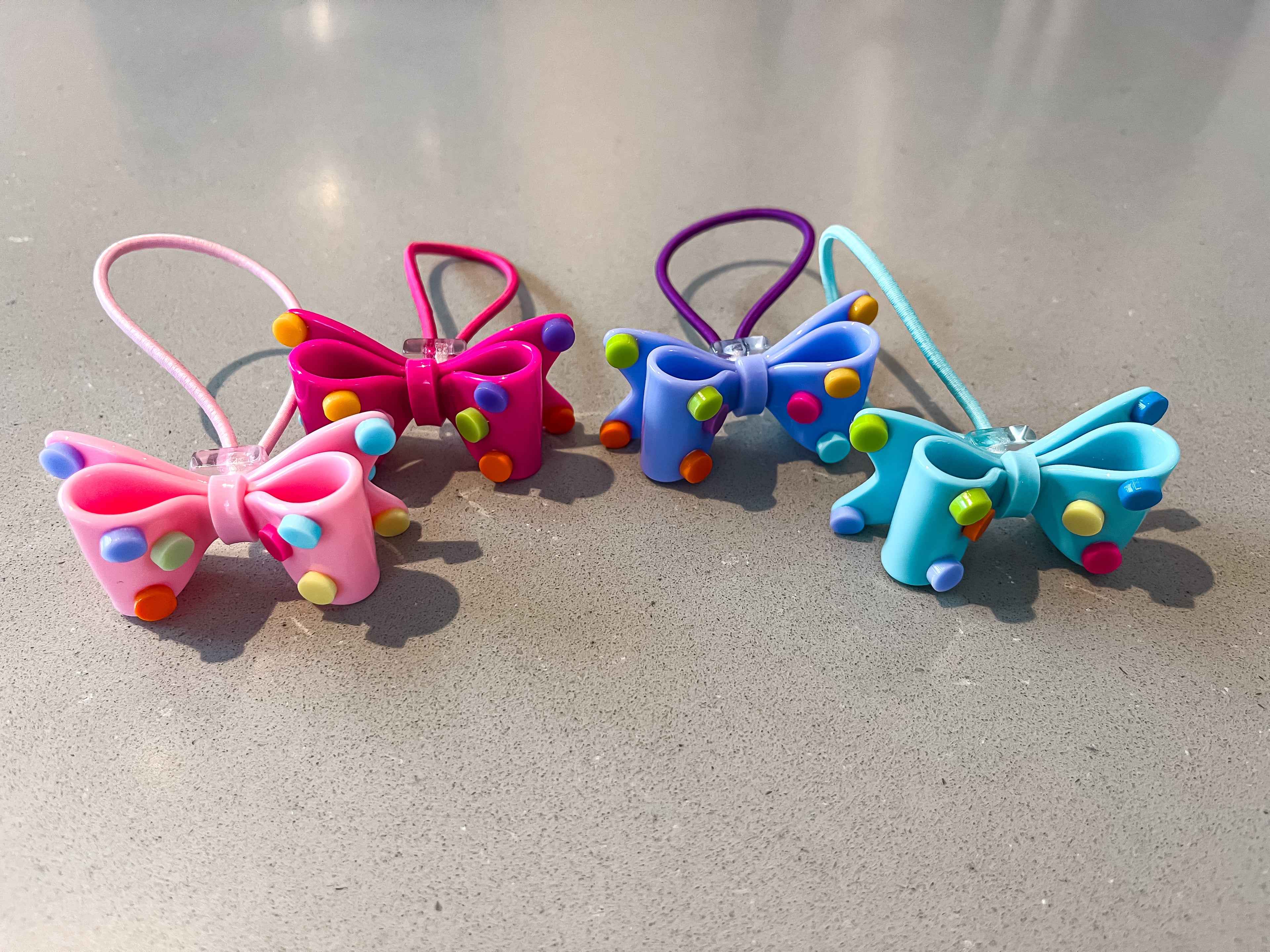 Acrylic bow with polkadots hair tie