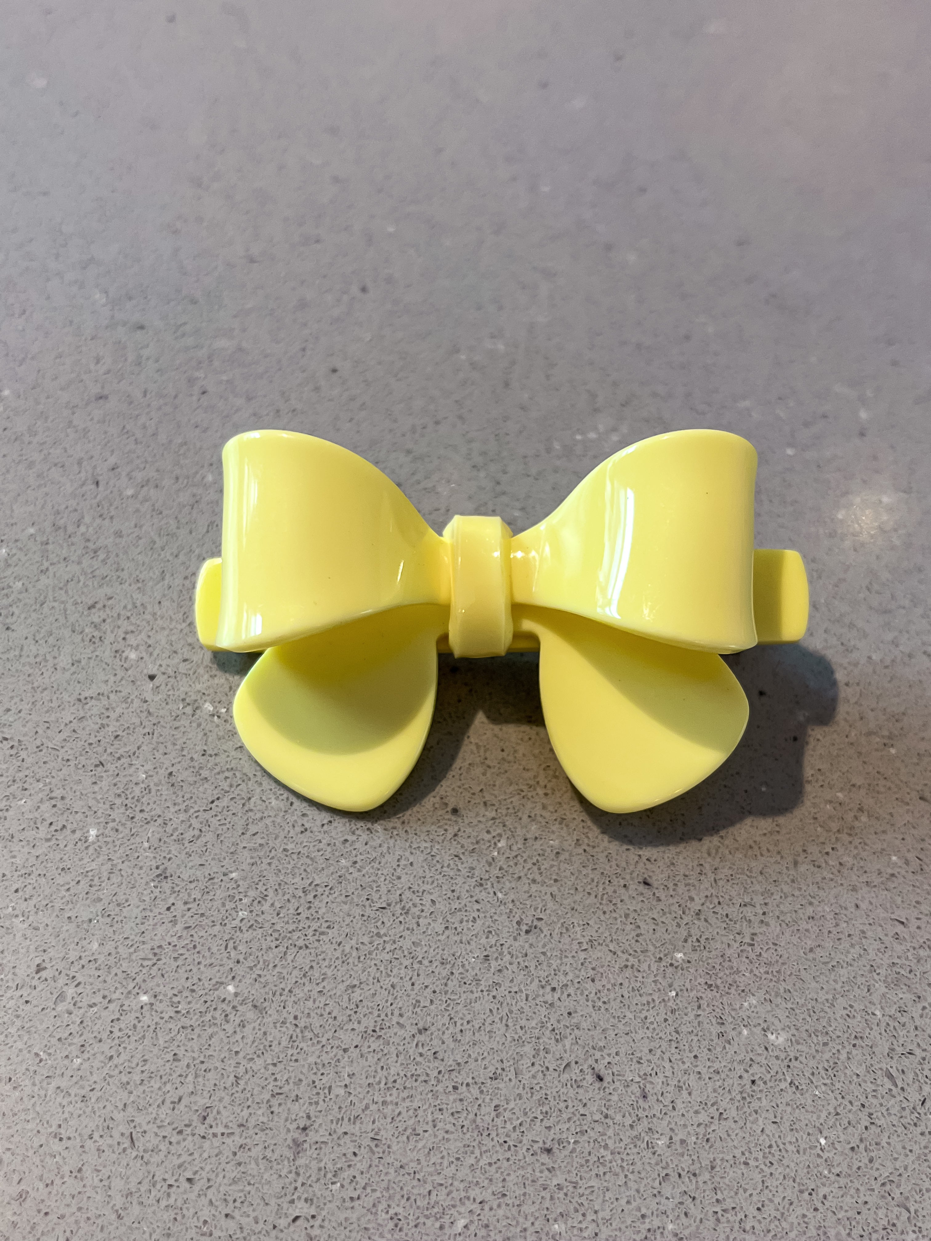 Yellow acrylic bow hair clip